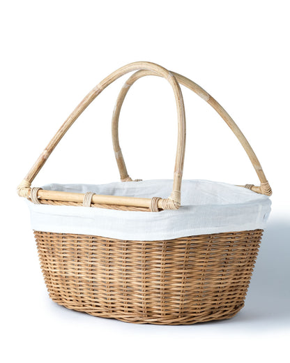 Cesta de ratán 100% natural Halmahera decorativa con asas de bambú y funda interior de tela, hecha a mano  con fibras naturales, forma ovalada, acabados en color natural, blanco y negro, Alto 38 cm Ancho 41 cm Profundidad 25 cm, fabricado Indonesia